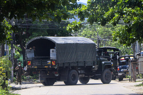 A police vehicle is parked at a road in South Okkalapa township to block anti-coup protesters' gathering in Yangon, Myanmar, Friday, April 9, 2021. Photo: AP