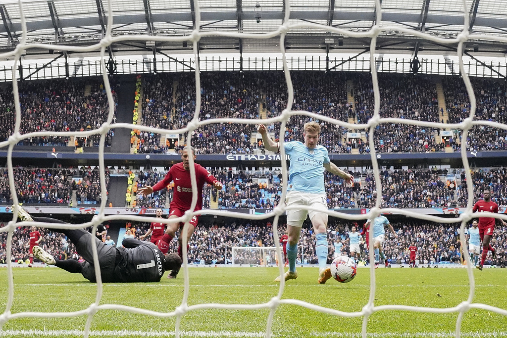 Liverpool jolt Man City as Arsenal go four points clear