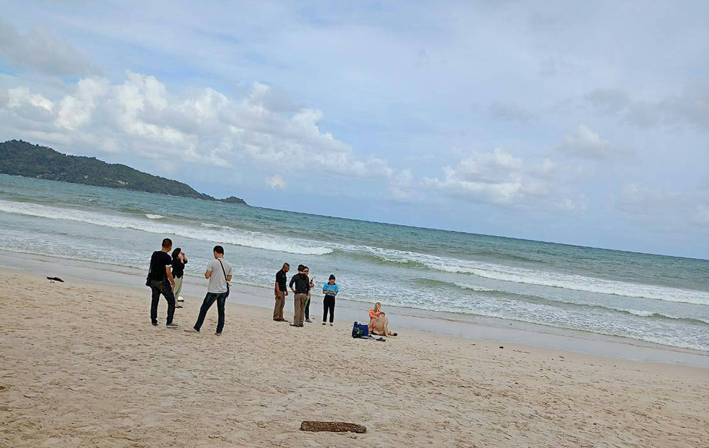 Chinese Tourist on the Beach